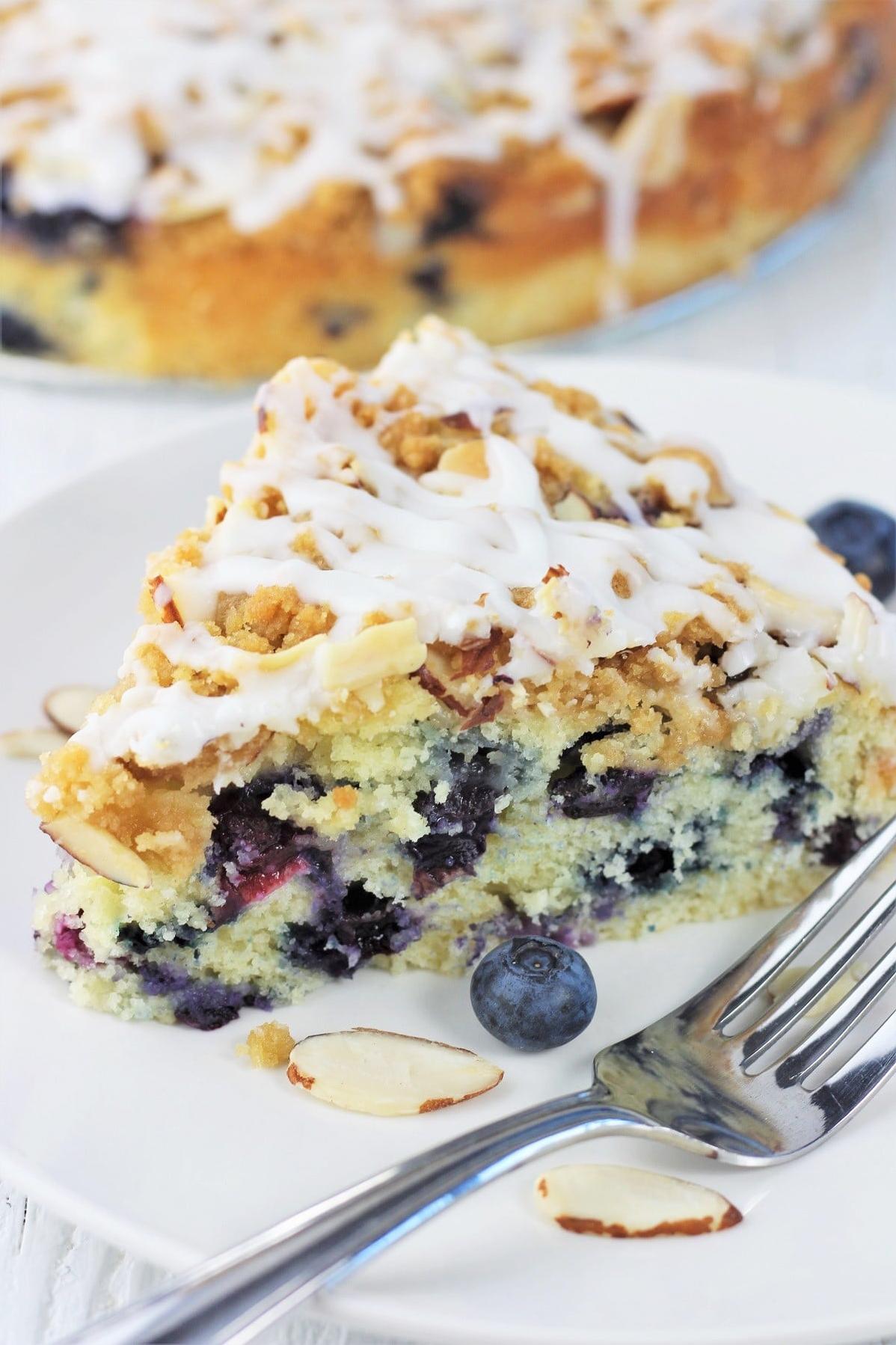  A slice of blueberry almond coffee cake, perfect for a cozy morning at home.