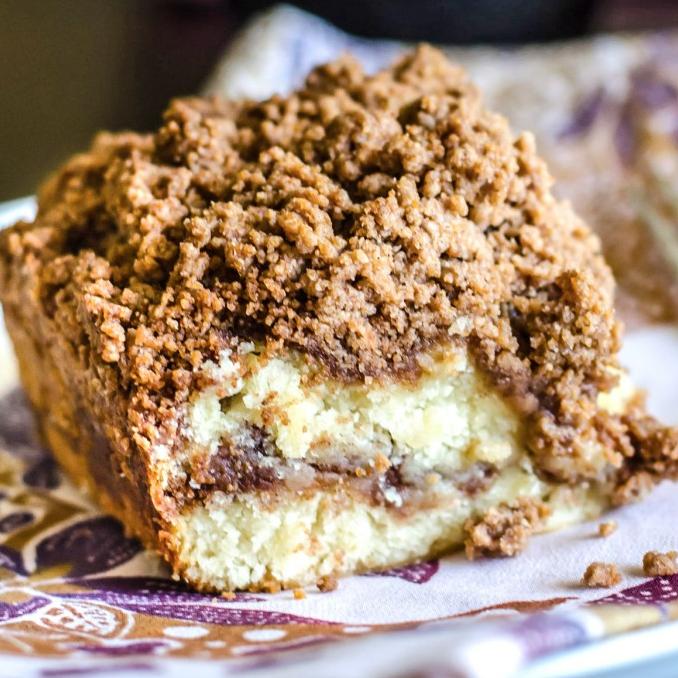  A slice of coffee cake and a hot cup of coffee - the perfect duo for a cozy morning.