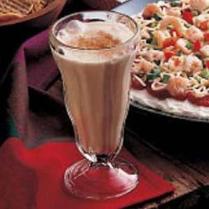  A swirl of whipped cream crowns this velvety cappuccino shake.