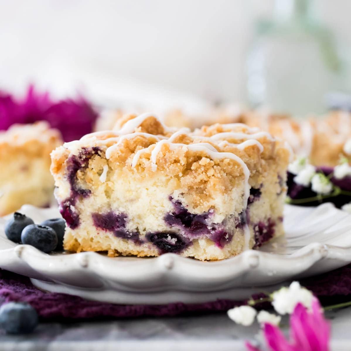  Dive into a slice of heaven with our Lots Blueberry Coffee Cake