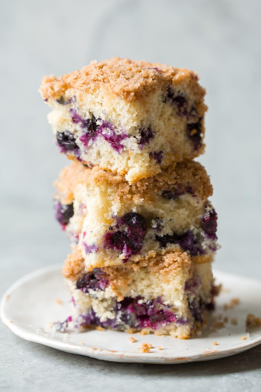  Freshly baked Blueberry Buckle Coffee Cake, golden crumbly goodness in every slice.