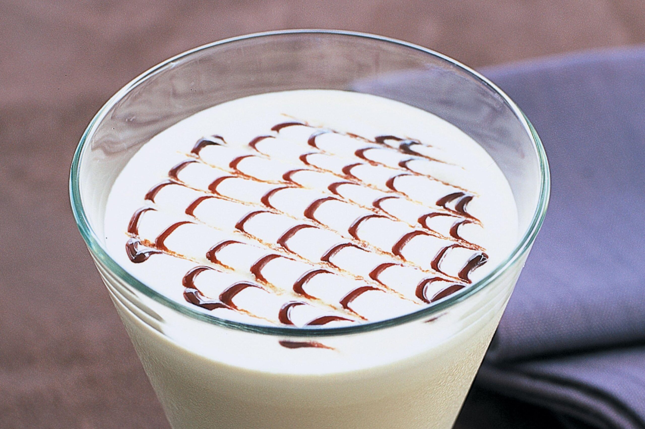  Indulge in the velvety richness of our creamy mocha cocktail.