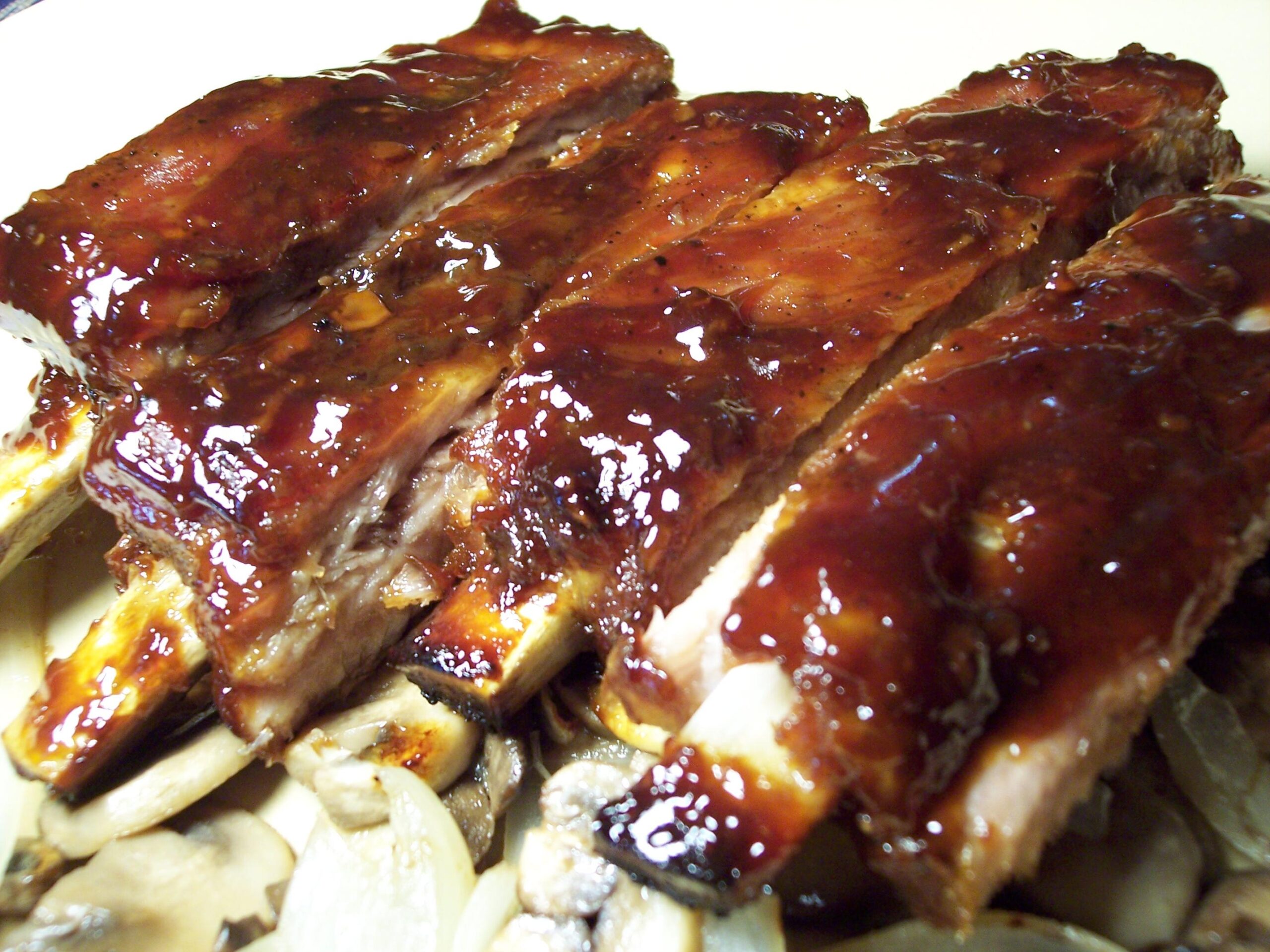  Mouth-watering Baby Back Ribs with a zesty Espresso BBQ sauce that packs a punch!