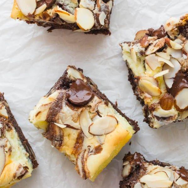  Rich chocolate flavor meets creamy cheesecake and crunchy almonds in these indulgent Mocha Almond Cheesecake Brownies!