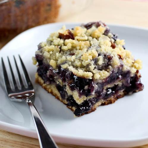  Savor the aroma of fresh blueberries and spices in this heavenly cake.