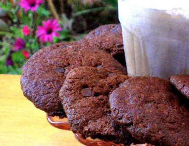  Sweet, chocolatey aroma fills the kitchen as the cookies bake to perfection.