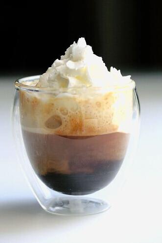  The contrast between the rich espresso and the sweet whipped cream is delightful